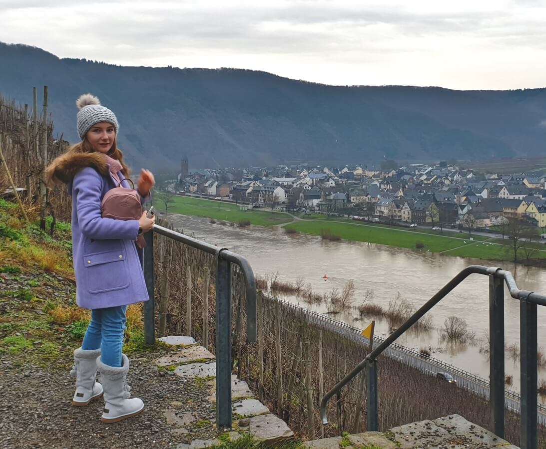Isabelle Anno admiring a view from a mountaintop in Cochem, Germany